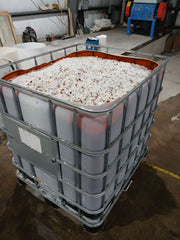 HDPE Natural 55 Gallon Drums Regrind  With paper on it