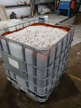 HDPE Natural 55 Gallon Drums Regrind  With paper on it